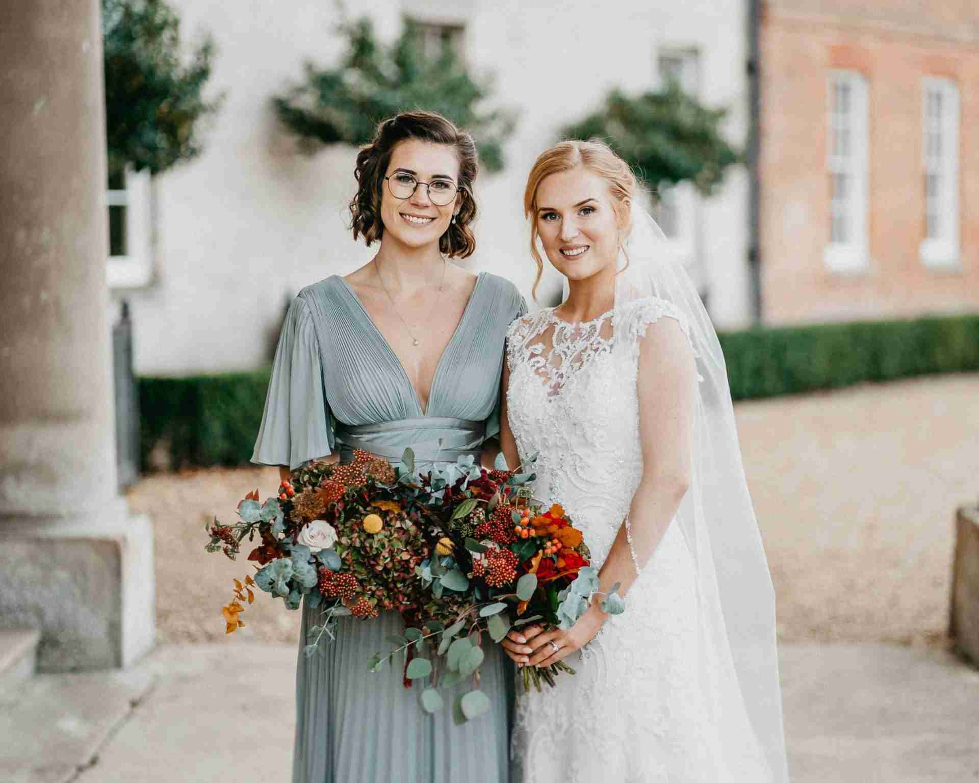 STUBTON HALL | Amelia & Tom 7 Bride and bridesmaid outside Stubton Hall wedding venue