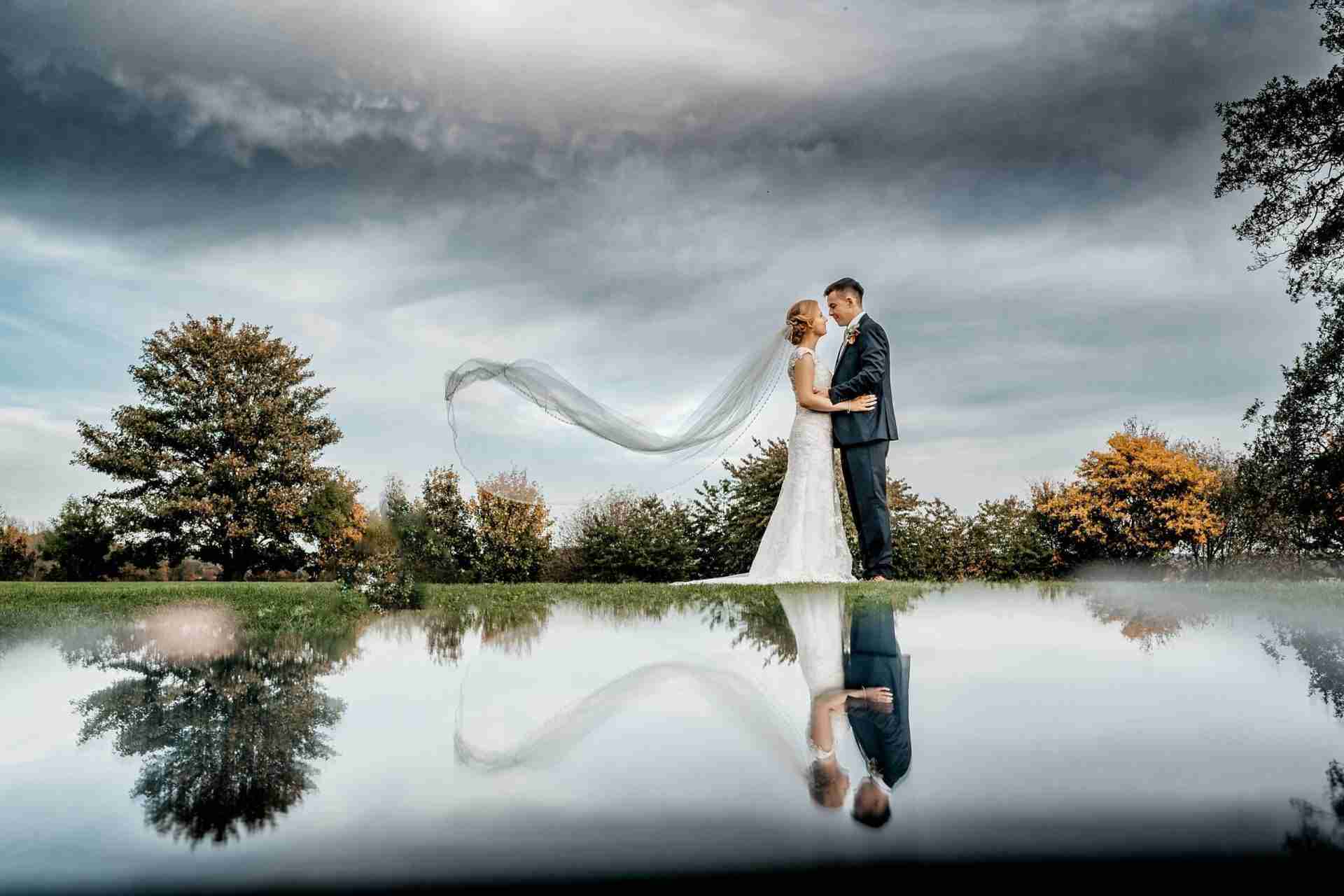 STUBTON HALL | Amelia & Tom 24 bride and groom reflection at Stubton Hall wedding venue