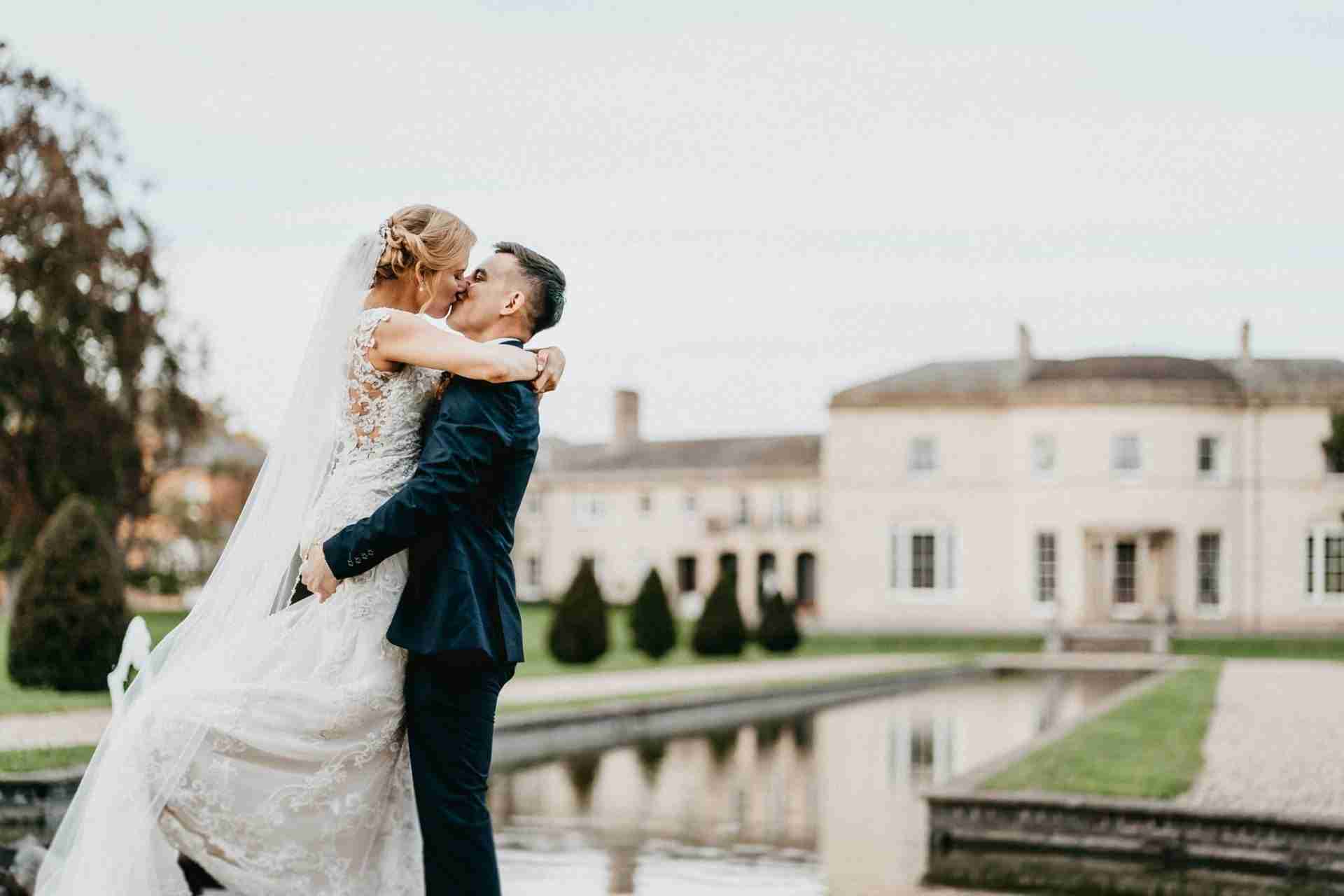 PORTFOLIO 39 Bride and groom embrace at Stubton Hall wedding venue