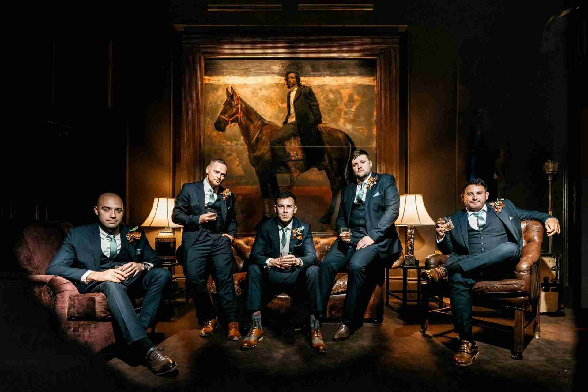 PORTFOLIO 42 Groomsmen sat inside Stubton Hall wedding venue