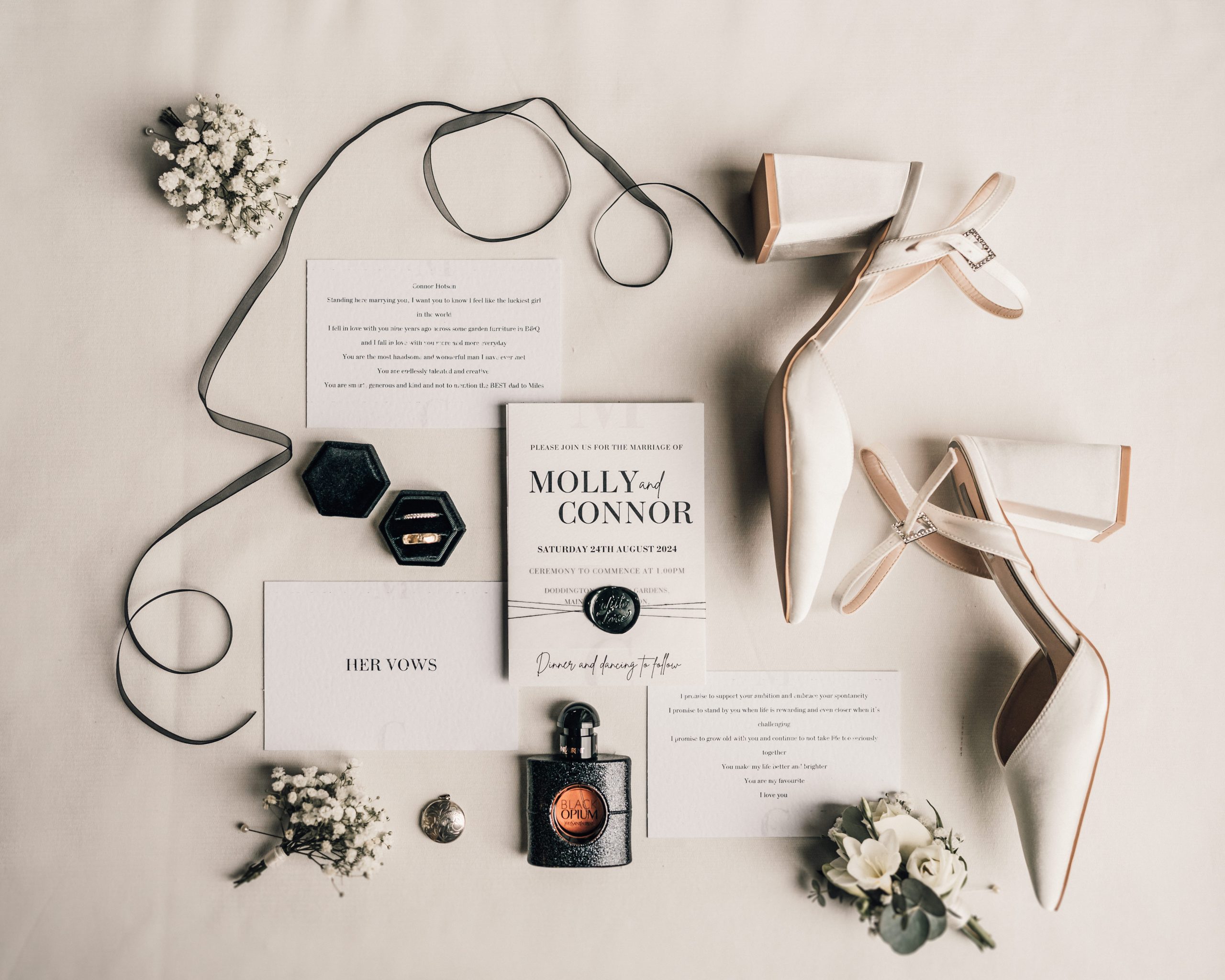 VENUE GUIDE | Doddington Hall 8 a white shoes and flowers on a white surface