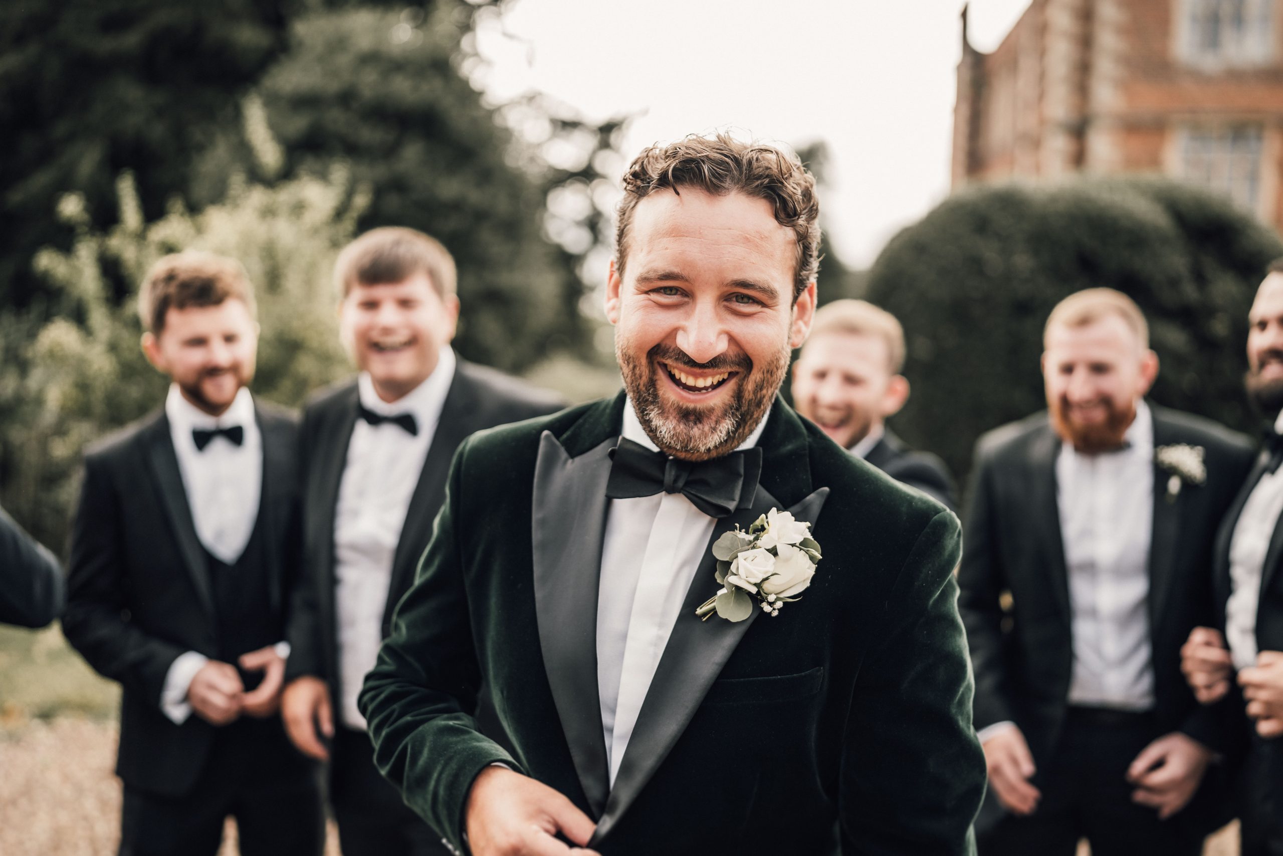 PORTFOLIO 73 a man in a tuxedo smiling