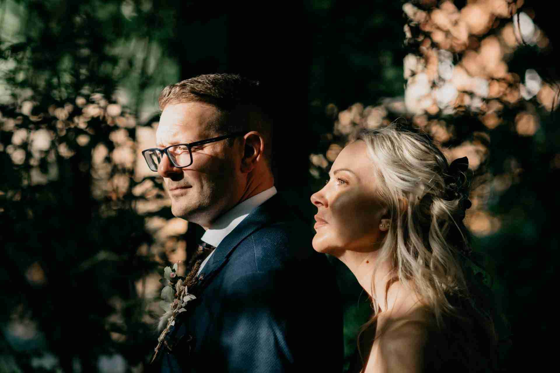 PORTFOLIO 86 a man and woman standing back to back